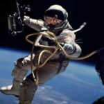 How do astronauts carry out spacewalks?