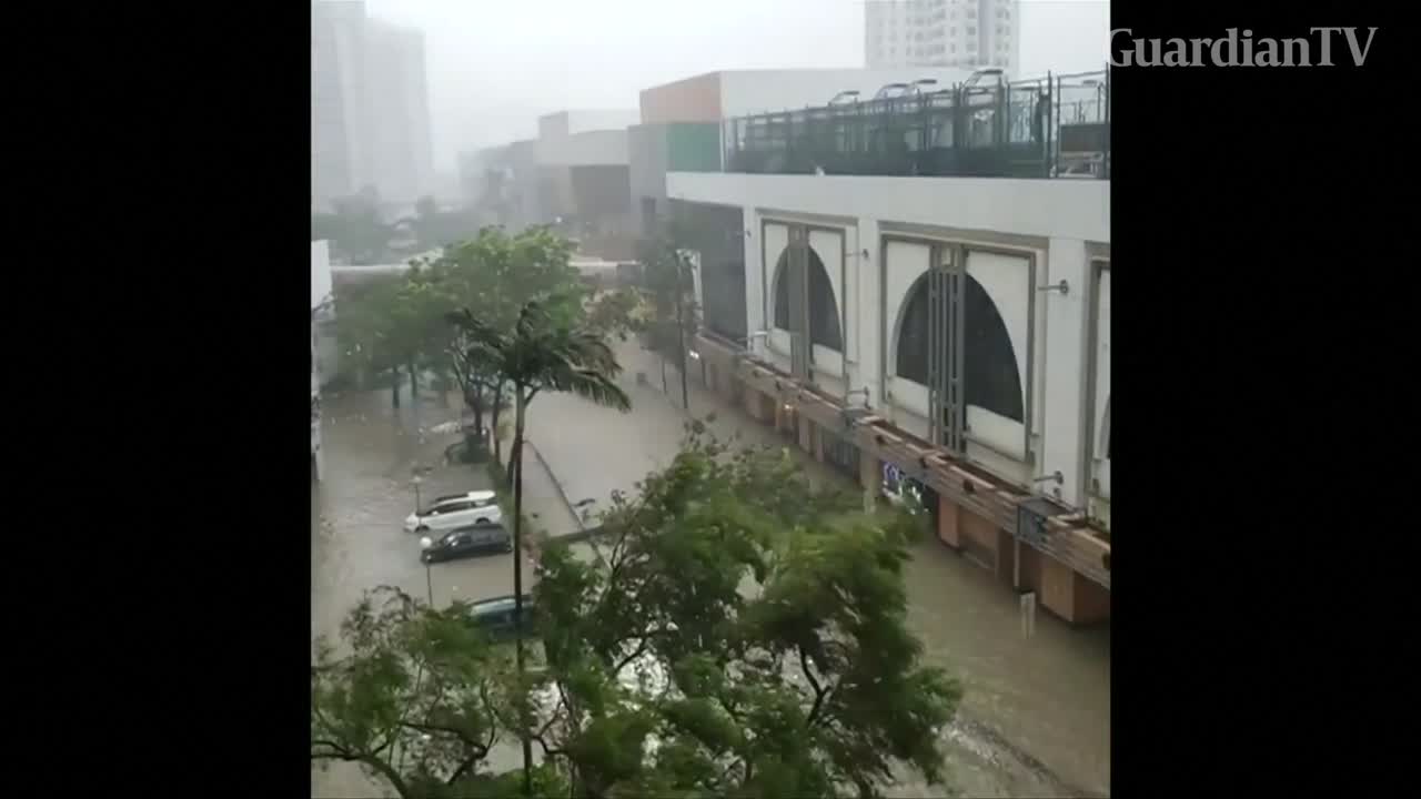 Heavy rainfall, flooding hit Hong Kong as super typhoon closes in ...