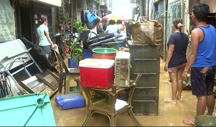 Residents return to Manila streets devastated by Typhoon Gaemi