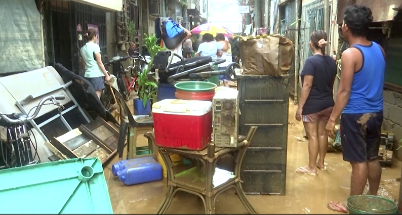 Residents return to Manila streets devastated by Typhoon Gaemi