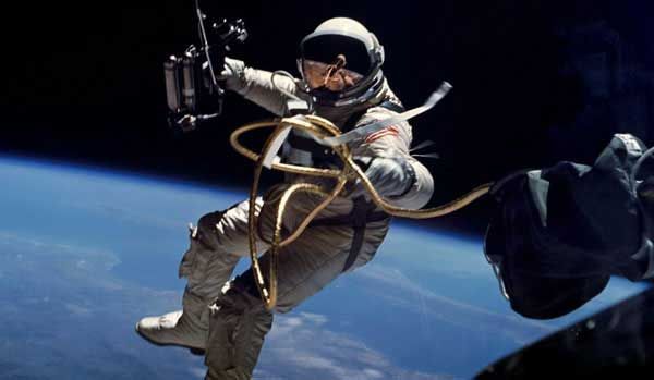 How do astronauts carry out spacewalks?