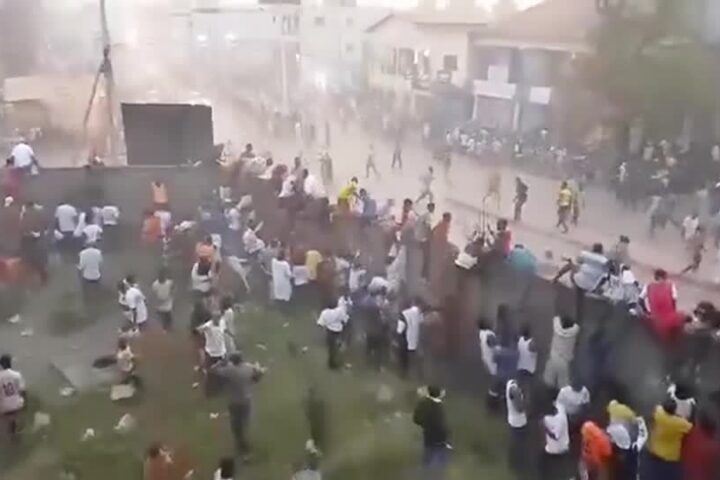 Video shows scores climbing Guinea stadium walls to escape crush