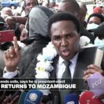 Exiled opposition leader returns to Mozambique and says he is president-elect