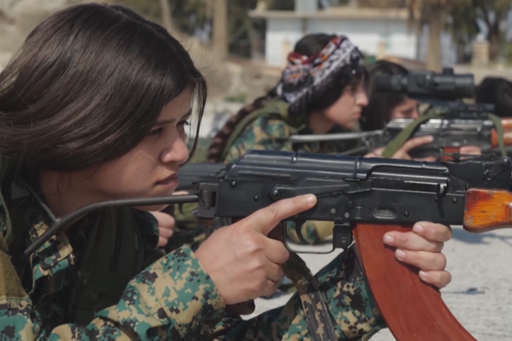 Kurdish fighters hesitate to join Syria's vision of a unified army