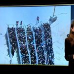 Real images of Palestinians lining up for aid accused of being AI-generated