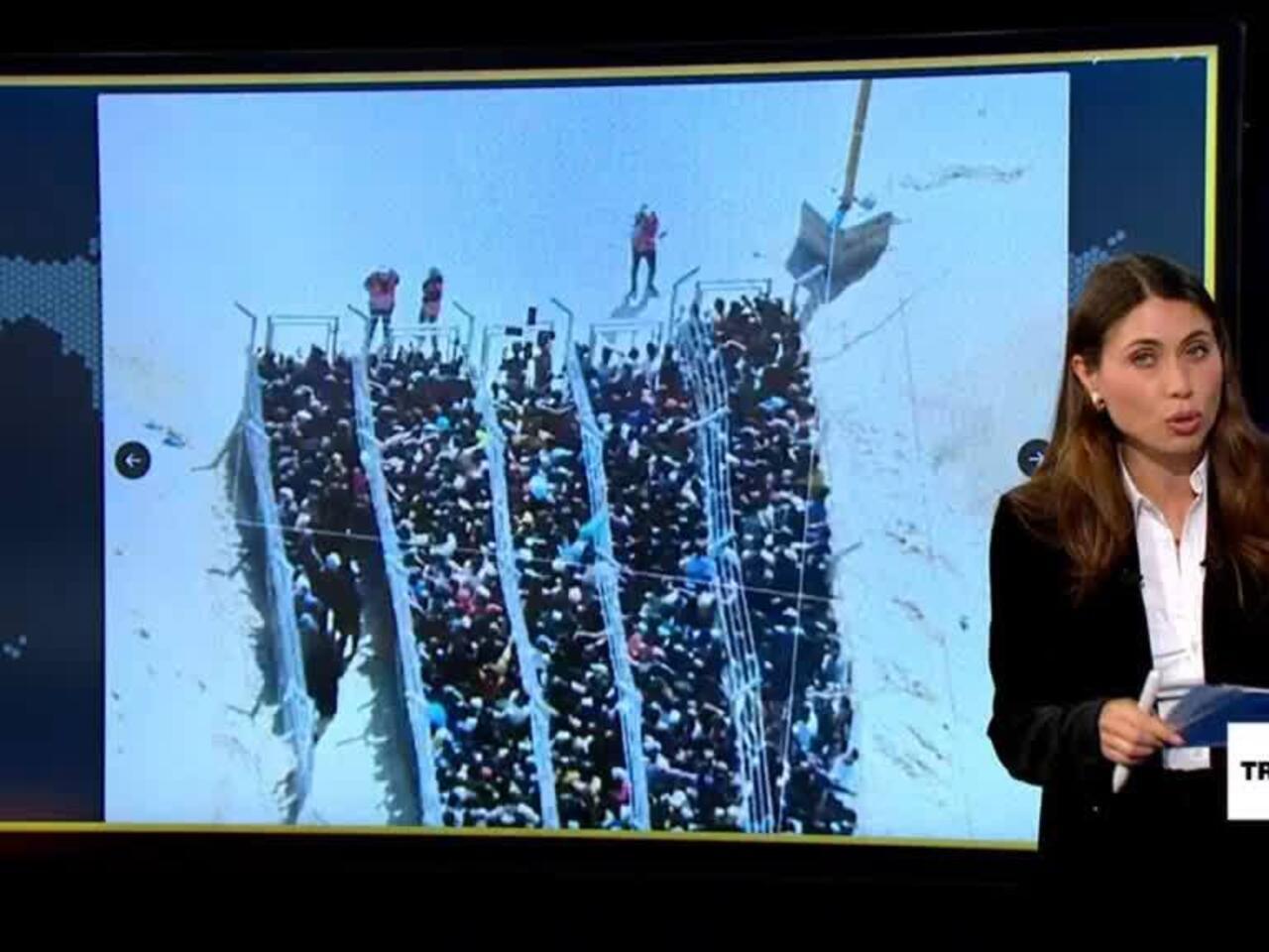 Real images of Palestinians lining up for aid accused of being AI-generated